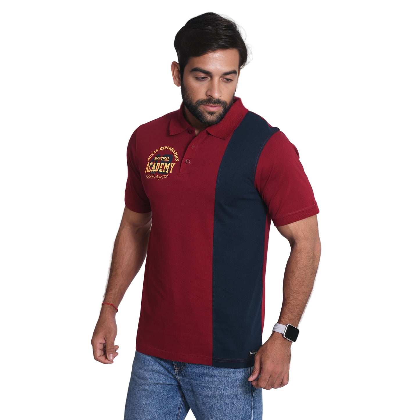 Man wearing a red and navy polo shirt with text on a white background