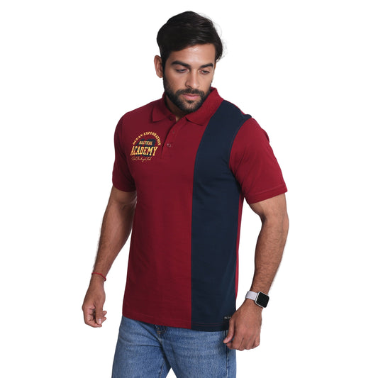 Man wearing a red and navy polo shirt with text on a white background